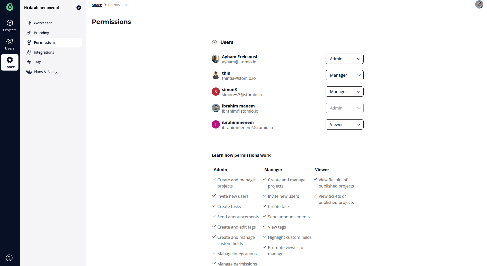 The Permissions page listing workspace members with a role selector for each